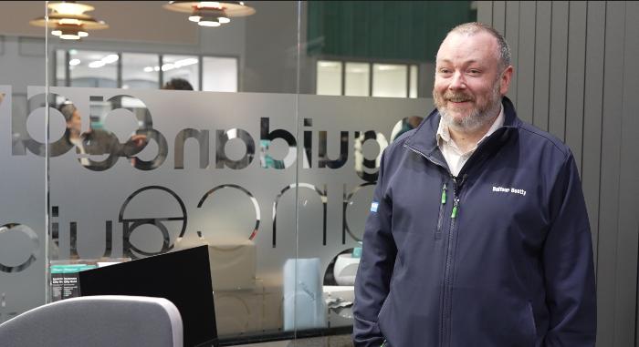 Duncan Gardner standing in a college campus