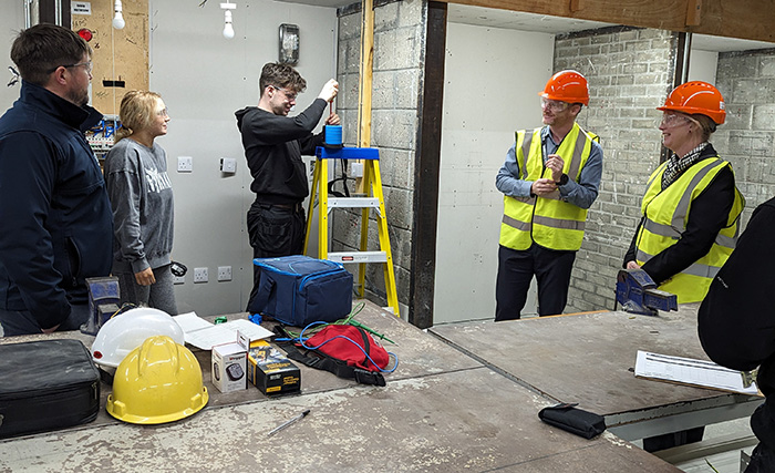 People on an indoor construction site