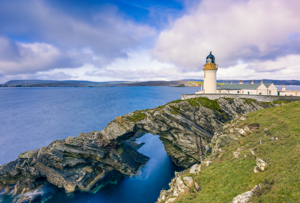 A lighthouse on a cliff