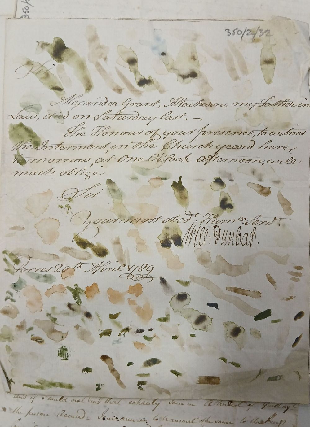 A hand-written letter with several watercolour marks in varying shades.