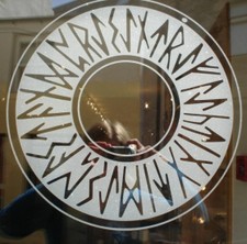 Sheila Fleet shop front door logo