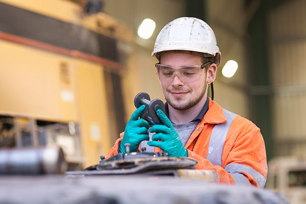 A young engineer in an engineering workshop